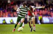18 April 2025; Daniel Cleary of Shamrock Rovers in action against Mason Melia of St Patrick's Athletic during the SSE Airtricity Men's Premier Division match between St Patrick's Athletic and Shamrock Rovers at Richmond Park in Dublin. Photo by Stephen McCarthy/Sportsfile