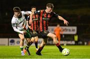 18 April 2025; James McManus of Bohemians in action against Cathal O'Sullivan of Cork City during the SSE Airtricity Men's Premier Division match between Bohemians and Cork City at Dalymount Park in Dublin. Photo by Shauna Clinton/Sportsfile