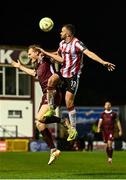 18 April 2025; Robbie Benson of Derry City in action against Vincent Borden of Galway United during the SSE Airtricity Men's Premier Division match between Galway United and Derry City at Eamonn Deacy Park in Galway. Photo by Piaras Ó Mídheach/Sportsfile