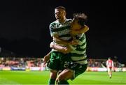 18 April 2025; Jack Byrne of Shamrock Rovers, left, and Daniel Cleary celebrates as team-mate Lee Grace, not pictured, scores their side's second goal during the SSE Airtricity Men's Premier Division match between St Patrick's Athletic and Shamrock Rovers at Richmond Park in Dublin. Photo by Stephen McCarthy/Sportsfile