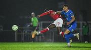 18 April 2025; Francely Lomboto of Sligo Rovers scores his side's fourth goal, despite pressure from Waterford's Maarten Pouwels, during the SSE Airtricity Men's Premier Division match between Waterford and Sligo Rovers at the Regional Sports Centre in Waterford. Photo by Seb Daly/Sportsfile