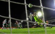 18 April 2025; Joe Redmond of St Patrick's Athletic heads to score his side's second goal as Shamrock Rovers goalkeeper Ed McGinty attempts to save during the SSE Airtricity Men's Premier Division match between St Patrick's Athletic and Shamrock Rovers at Richmond Park in Dublin. Photo by Stephen McCarthy/Sportsfile