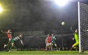 18 April 2025; Joe Redmond of St Patrick's Athletic, left, heads to score his side's second goal during the SSE Airtricity Men's Premier Division match between St Patrick's Athletic and Shamrock Rovers at Richmond Park in Dublin. Photo by Stephen McCarthy/Sportsfile