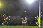 18 April 2025; Joe Redmond of St Patrick's Athletic, left, heads to score his side's second goal during the SSE Airtricity Men's Premier Division match between St Patrick's Athletic and Shamrock Rovers at Richmond Park in Dublin. Photo by Stephen McCarthy/Sportsfile