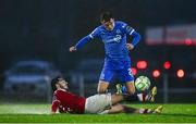 18 April 2025; Conan Noonan of Waterford is tackled by Ronan Manning of Sligo Rovers during the SSE Airtricity Men's Premier Division match between Waterford and Sligo Rovers at the Regional Sports Centre in Waterford. Photo by Seb Daly/Sportsfile