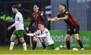 18 April 2025; Adam McDonnell of Bohemians reenacts how Cathal O'Sullivan of Cork City had just pushed team-mate Ross Tierney to referee Paul McLaughlin, not pictured, during the SSE Airtricity Men's Premier Division match between Bohemians and Cork City at Dalymount Park in Dublin. Photo by Shauna Clinton/Sportsfile