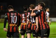 18 April 2025; James McManus of Bohemians, 14, is congratulated by team-mate Dayle Rooney, right, after scoring their side's first goal during the SSE Airtricity Men's Premier Division match between Bohemians and Cork City at Dalymount Park in Dublin. Photo by Shauna Clinton/Sportsfile