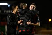 18 April 2025; James McManus of Bohemians, right, is hugged by team-mate Adam McDonnell, centre, after their side's victory in the SSE Airtricity Men's Premier Division match between Bohemians and Cork City at Dalymount Park in Dublin. Photo by Shauna Clinton/Sportsfile
