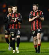 18 April 2025; Bohemians players Ross Tierney, left, and James McManus acknowledge supporters after their side's victory in the SSE Airtricity Men's Premier Division match between Bohemians and Cork City at Dalymount Park in Dublin. Photo by Shauna Clinton/Sportsfile