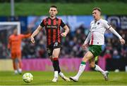 18 April 2025; Sean Grehan of Bohemians in action against Alex Nolan of Cork City during the SSE Airtricity Men's Premier Division match between Bohemians and Cork City at Dalymount Park in Dublin. Photo by Shauna Clinton/Sportsfile