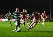 18 April 2025; Darragh Nugent of Shamrock Rovers in action against Sean Hoare of St Patrick's Athletic during the SSE Airtricity Men's Premier Division match between St Patrick's Athletic and Shamrock Rovers at Richmond Park in Dublin. Photo by Stephen McCarthy/Sportsfile