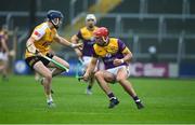 19 April 2025; Conor Heame of Wexford in action against Keelan Molloy of Antrim during the Leinster GAA Hurling Senior Championship Round 1 match between Wexford and Antrim at Chadwicks Wexford Park in Wexford. Photo by Matt Browne/Sportsfile