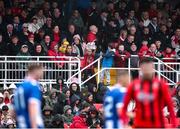 19 April 2025; A young Ringmahon Rangers FC supporter holds up a banner during the FAI Intermediate Cup final match between College Corinthians AFC and Ringmahon Rangers FC at Turners Cross Stadium in Cork. Photo by Michael P Ryan/Sportsfile
