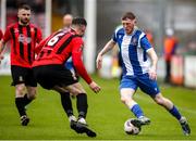 19 April 2025; Killian Cooper of College Corinthians AFC in action against Tony Whitehead of Ringmahon Rangers FC during the FAI Intermediate Cup final match between College Corinthians AFC and Ringmahon Rangers FC at Turners Cross Stadium in Cork. Photo by Michael P Ryan/Sportsfile