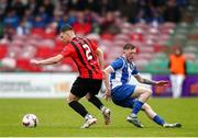 19 April 2025; Glenn Towler of Ringmahon Rangers FC in action against Killian Cooper of College Corinthians AFC during the FAI Intermediate Cup final match between College Corinthians AFC and Ringmahon Rangers FC at Turners Cross Stadium in Cork. Photo by Michael P Ryan/Sportsfile
