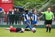 19 April 2025; Destiny Okonkwo of College Corinthians AFC is tackled by Anthony O'Donnell of Ringmahon Rangers FC during the FAI Intermediate Cup final match between College Corinthians AFC and Ringmahon Rangers FC at Turners Cross Stadium in Cork. Photo by Michael P Ryan/Sportsfile