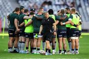 19 April 2025; Connacht Interim Coach Cullie Tucker looks on as Connacht players huddle before the United Rugby Championship match between DHL Stormers and Connacht at DHL Stadium in Cape Town, South Africa. Photo by Shaun Roy/Sportsfile