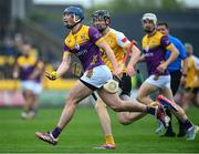19 April 2025; Charlie McGuckin of Wexford in action against Joe Maskey of Antrim during the Leinster GAA Hurling Senior Championship Round 1 match between Wexford and Antrim at Chadwicks Wexford Park in Wexford. Photo by Matt Browne/Sportsfile