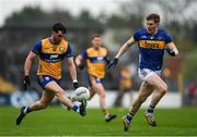 19 April 2025; Aaron Griffin of Clare in action against Paudie Feehan of Tipperary during the Munster GAA Football Senior Championship semi-final match between Clare and Tipperary at Zimmer Biomet Cusack Park in Ennis, Clare. Photo by Tom Beary/Sportsfile