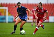 19 April 2025; Kate Thompson of Galway United in action against Muireann Devaney of Sligo Rovers during the SSE Airtricity Women's Premier Division match between Sligo Rovers and Galway United at The Showgrounds in Sligo. Photo by Tyler Miller/Sportsfile