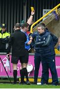 19 April 2025; Antrim manager Davy Fitzgerald is yellow carded by referee Colm Lyons during the Leinster GAA Hurling Senior Championship Round 1 match between Wexford and Antrim at Chadwicks Wexford Park in Wexford. Photo by Matt Browne/Sportsfile