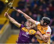 19 April 2025; Joe Maskey of Antrim in action against Jack Redmond of Wexford during the Leinster GAA Hurling Senior Championship Round 1 match between Wexford and Antrim at Chadwicks Wexford Park in Wexford. Photo by Matt Browne/Sportsfile