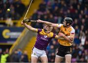 19 April 2025; Joe Maskey of Antrim in action against Jack Redmond of Wexford during the Leinster GAA Hurling Senior Championship Round 1 match between Wexford and Antrim at Chadwicks Wexford Park in Wexford. Photo by Matt Browne/Sportsfile