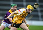 19 April 2025; Cormac McKeown of Antrim in action against Kevin Foley of Wexford during the Leinster GAA Hurling Senior Championship Round 1 match between Wexford and Antrim at Chadwicks Wexford Park in Wexford. Photo by Matt Browne/Sportsfile