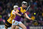 19 April 2025; Eoin Ryan of Wexford in action against Seann Elliot of Antrim during the Leinster GAA Hurling Senior Championship Round 1 match between Wexford and Antrim at Chadwicks Wexford Park in Wexford. Photo by Matt Browne/Sportsfile