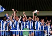 19 April 2025; College Corinthians AFC captain Craig Donnellan lifts the cup after the FAI Intermediate Cup final match between College Corinthians AFC and Ringmahon Rangers FC at Turners Cross Stadium in Cork. Photo by Michael P Ryan/Sportsfile