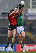 19 April 2025; Pat Havern of Down in action against Paul Breen of Fermanagh during the Ulster GAA Football Senior Championship quarter-final match between Fermanagh and Down at Brewster Park in Enniskillen, Fermanagh. Photo by Ramsey Cardy/Sportsfile