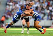 19 April 2025; David Hawkshaw of Connacht is tackled by Salmaan Moerat and Suleiman Hartzenberg of DHL Stormers during the United Rugby Championship match between DHL Stormers and Connacht at DHL Stadium in Cape Town, South Africa. Photo by Shaun Roy/Sportsfile