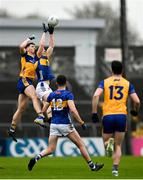 19 April 2025; Brian McNamara of Clare and Paudie Feehan of Tipperary contest a kickout during the Munster GAA Football Senior Championship semi-final match between Clare and Tipperary at Zimmer Biomet Cusack Park in Ennis, Clare. Photo by Tom Beary/Sportsfile
