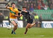 19 April 2025; Jordan Flynn of Mayo in action against Barry McNulty of Leitrim during the Connacht GAA Football Senior Championship semi-final match between Leitrim and Mayo at Avant Money Páirc Seán Mac Diarmada in Carrick-on-Shannon, Leitrim. Photo by Thomas Flinkow/Sportsfile