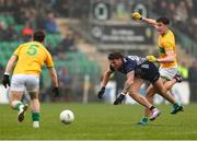 19 April 2025; Jordan Flynn of Mayo in action against Barry McNulty of Leitrim during the Connacht GAA Football Senior Championship semi-final match between Leitrim and Mayo at Avant Money Páirc Seán Mac Diarmada in Carrick-on-Shannon, Leitrim. Photo by Thomas Flinkow/Sportsfile