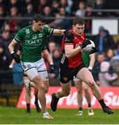 19 April 2025; Odhran Murdock of Down in action against Conor McGee of Fermanagh during the Ulster GAA Football Senior Championship quarter-final match between Fermanagh and Down at Brewster Park in Enniskillen, Fermanagh. Photo by Ramsey Cardy/Sportsfile
