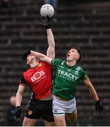 19 April 2025; Odhran Murdock of Down in action against Joe McDade of Fermanagh during the Ulster GAA Football Senior Championship quarter-final match between Fermanagh and Down at Brewster Park in Enniskillen, Fermanagh. Photo by Ramsey Cardy/Sportsfile