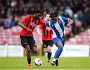 19 April 2025; Destiny Okonkwo of College Corinthians AFC in action against Alan Happi of Ringmahon Rangers FC during the FAI Intermediate Cup final match between College Corinthians AFC and Ringmahon Rangers FC at Turners Cross Stadium in Cork. Photo by Michael P Ryan/Sportsfile