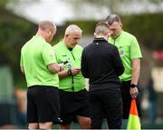 19 April 2025; Match officials during a the break before extratime during the FAI Intermediate Cup final match between College Corinthians AFC and Ringmahon Rangers FC at Turners Cross Stadium in Cork. Photo by Michael P Ryan/Sportsfile
