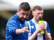 19 April 2025; College Corinthians AFC manager Gary Hackett speaks to his players before the start of extratime during the FAI Intermediate Cup final match between College Corinthians AFC and Ringmahon Rangers FC at Turners Cross Stadium in Cork. Photo by Michael P Ryan/Sportsfile