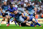 19 April 2025; Jack Aungier of Connacht is tackled by Louw Nel and JD Schickerling of DHL Stormers during the United Rugby Championship match between DHL Stormers and Connacht at DHL Stadium in Cape Town, South Africa. Photo by Shaun Roy/Sportsfile