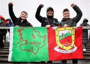 19 April 2025; Mayo supporters, from left, Jack Brown, Grace Conroy, and Oisin Waters Moran, all from Kilmaine, during the Connacht GAA Football Senior Championship semi-final match between Leitrim and Mayo at Avant Money Páirc Seán Mac Diarmada in Carrick-on-Shannon, Leitrim. Photo by Thomas Flinkow/Sportsfile