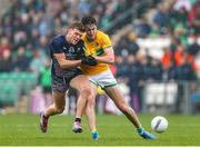 19 April 2025; Jordan Flynn of Mayo is tackled by Barry McNulty of Leitrim during the Connacht GAA Football Senior Championship semi-final match between Leitrim and Mayo at Avant Money Páirc Seán Mac Diarmada in Carrick-on-Shannon, Leitrim. Photo by Thomas Flinkow/Sportsfile