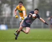 19 April 2025; Enda Hession of Mayo is tackled by Barry McNulty of Leitrim during the Connacht GAA Football Senior Championship semi-final match between Leitrim and Mayo at Avant Money Páirc Seán Mac Diarmada in Carrick-on-Shannon, Leitrim. Photo by Thomas Flinkow/Sportsfile