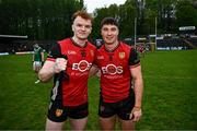19 April 2025; Danny Magill, left, and Daniel Guinness of Down celebrate after the Ulster GAA Football Senior Championship quarter-final match between Fermanagh and Down at Brewster Park in Enniskillen, Fermanagh. Photo by Ramsey Cardy/Sportsfile