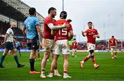 19 April 2025; Thaakir Abrahams of Munster, 15, is congratulated by team mate Andrew Smith after scoring their side's first try during the United Rugby Championship match between Munster and Vodacom Bulls at Thomond Park in Limerick. Photo by David Fitzgerald/Sportsfile