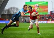 19 April 2025; Thaakir Abrahams of Munster on his way to scoring his side's first try despite the attempted tackle from David Kriel of Vodacom Bulls during the United Rugby Championship match between Munster and Vodacom Bulls at Thomond Park in Limerick. Photo by David Fitzgerald/Sportsfile