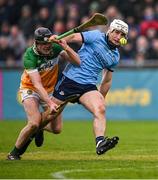 19 April 2025; Andy Dunphy of Dublin in action against Cathal King of Offaly during the Leinster GAA Hurling Senior Championship Round 1 match between Dublin and Offaly at Parnell Park in Dublin. Photo by Ray McManus/Sportsfile