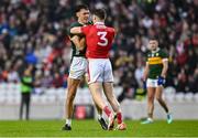 19 April 2025; David Clifford of Kerry and Daniel O'Mahony of Cork tussle off the ball during the Munster GAA Football Senior Championship semi-final match between Cork and Kerry at Supervalu Páirc Uí Chaoimh in Cork. Photo by Piaras Ó Mídheach/Sportsfile