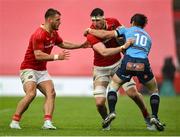 19 April 2025; Tom Ahern of Munster is tackled by Johan Goosen of Vodacom Bulls during the United Rugby Championship match between Munster and Vodacom Bulls at Thomond Park in Limerick. Photo by David Fitzgerald/Sportsfile
